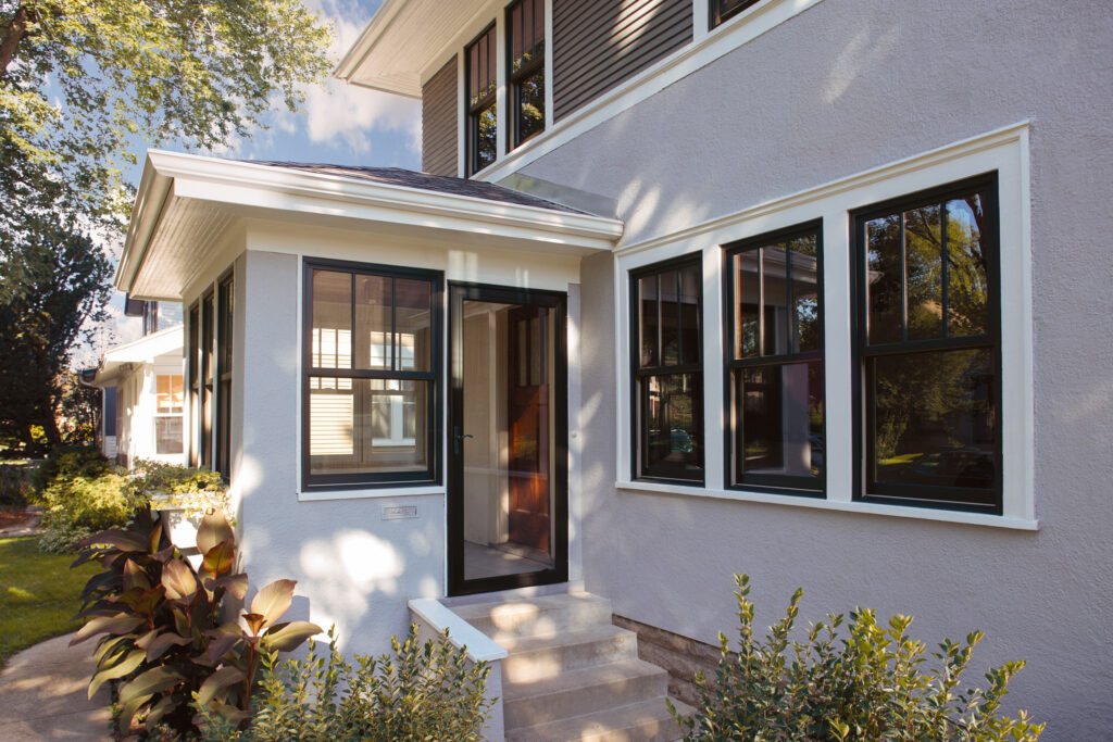 Updated home exterior with replacement siding and trim