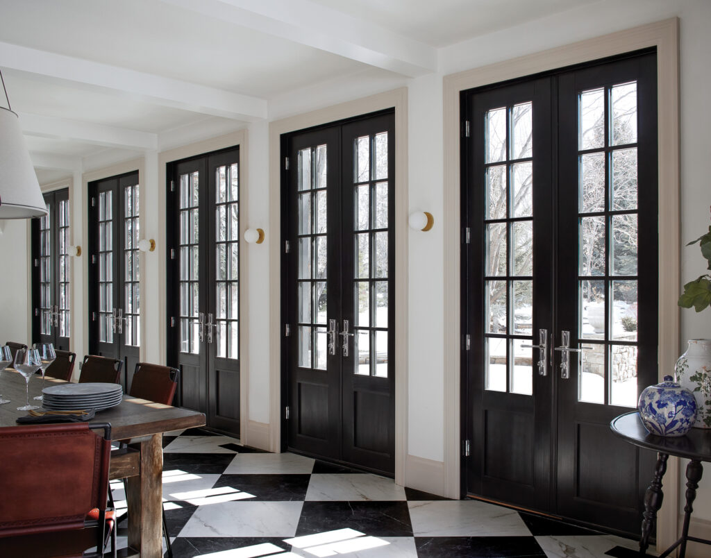 Black front door installation with decorative hardware by Northern Virginia high quality installers