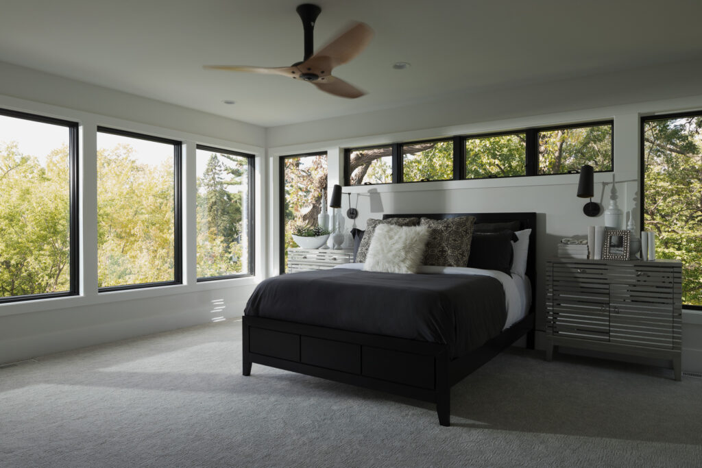 Black framed replacement windows on a modern home
