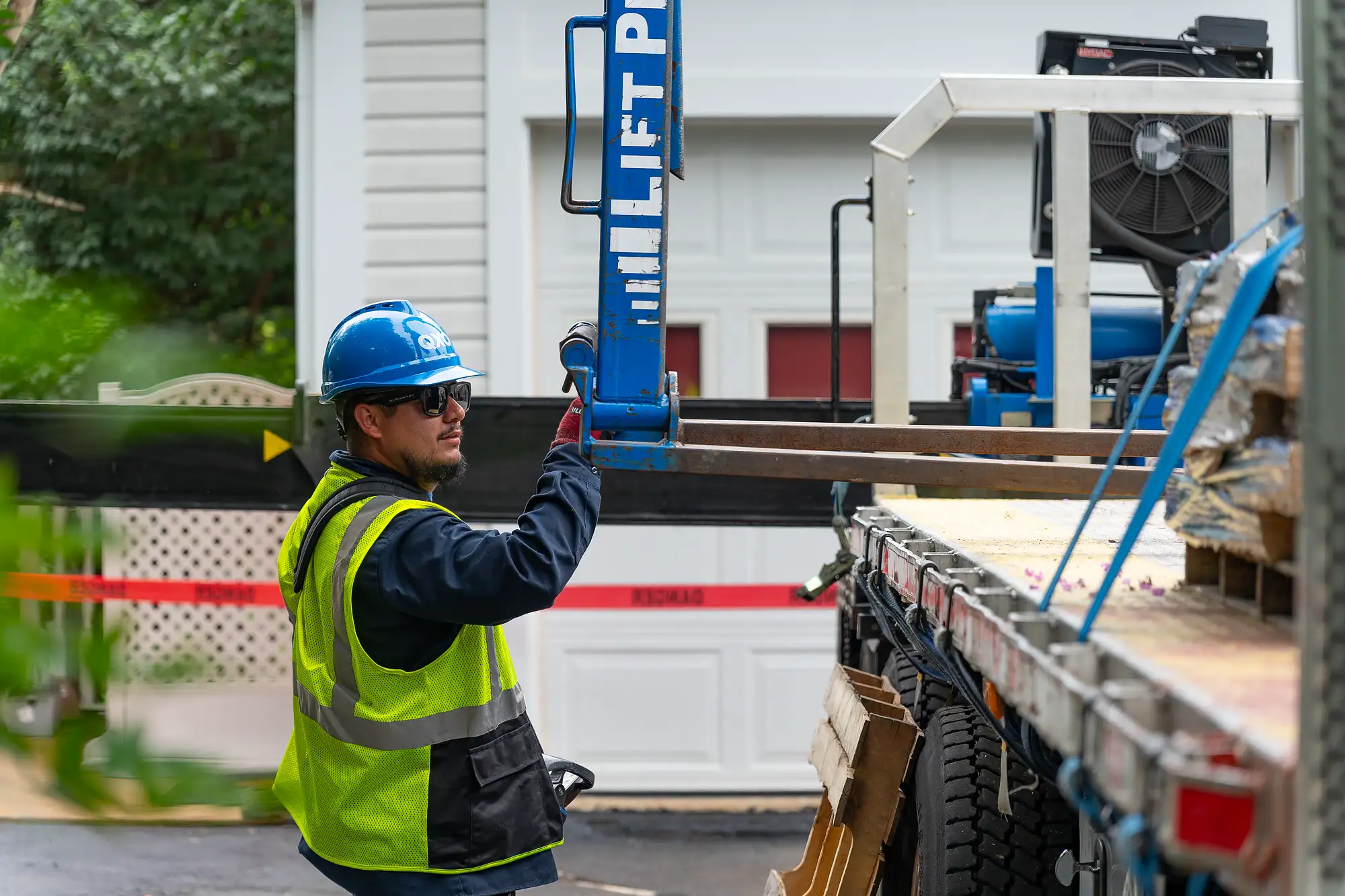 Roofing professionals preparing shingles for installation in Northern Virginia